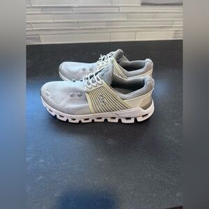 On Running Gray and White Athletic Shoes